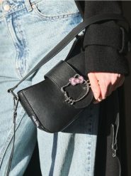 Torebka Hello Kitty - czarny. Czarne torebki do ręki damskie Sinsay, bez wzorów, bez dodatków. Za 49.99 zł.