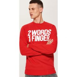 Bluza z napisem - Czerwony. Bluzy męskie marki KALENJI. W wyprzedaży za 49.99 zł.