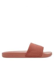 Calvin Klein Jeans Klapki Slide Monogram Hardware YW0YW01713 Koralowy. Pomarańczowe klapki damskie Calvin Klein Jeans, bez wzorów, z jeansu, bez obcasa. Za 119.99 zł.