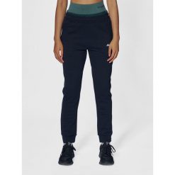 Spodnie dresowe regularne damskie Hummel Elemental. Czarne legginsy damskie Hummel, bez wzorów, z dresówki, do biegania. Za 135.00 zł.
