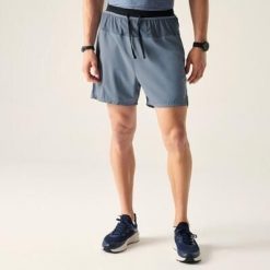 Męskie spodenki Ultimate II. Niebieskie krótkie spodenki sportowe męskie Dare 2b, m, bez wzorów, z materiału, trekkingowe. Za 278.00 zł.