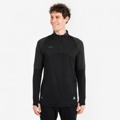 Bluza piłkarska Kipsta CLR półsuwak. Czarne bluzy męskie KIPSTA, m, bez wzorów, z materiału, bez kaptura. Za 129.99 zł.
