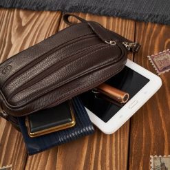 Paolo Peruzzi Saszetka męska skórzana do ręki brązowa T-129-BR. Brązowe saszetki męskie Paolo Peruzzi. Za 178.58 zł.