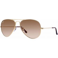Okulary przeciwsłoneczne "RB3025" w kolorze złotym. Żółte okulary przeciwsłoneczne męskie marki Balenciaga, Prada, Tom Ford. W wyprzedaży za 439.95 zł.