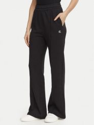 Calvin Klein Jeans Spodnie dresowe Monogram LV047H220G Czarny Regular Fit. Czarne spodnie dresowe damskie Calvin Klein Jeans, xs, bez wzorów, z bawełny. Za 369.99 zł.