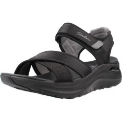 Sandały SKECHERS 164078S Czarny. Czarne sandały damskie Skechers, bez wzorów, z materiału, bez obcasa, bez zapięcia. Za 234.99 zł.