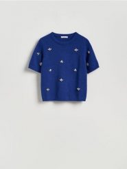 Sweter z błyszczącą aplikacją - niebieski. Niebieskie swetry damskie Reserved, l, z aplikacjami, z dzianiny, bez kołnierzyka, bez ramiączek, bez kaptura. Za 139.99 zł.