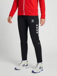 Damskie spodnie dresowe Hummel Core 2.0 Woven. Białe spodnie dresowe damskie Hummel, s, bez wzorów, z dresówki. Za 269.50 zł.