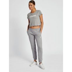Damska koszulka crop top Hummel Legacy. Żółte t-shirty damskie Hummel, s, bez wzorów, z bawełny, bez kołnierzyka. Za 94.50 zł.