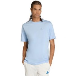 Koszulka męska adidas Color Icon Graphic. Niebieskie koszulki sportowe męskie Adidas, l, bez wzorów, z bawełny, bez kołnierzyka, bez ramiączek. Za 75.99 zł.