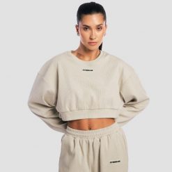 Bluza damska krótka oversize bez kaptura szara Aura. Szare bluzy damskie GYMBEAM, m, bez wzorów, z bawełny, bez kaptura, na fitness i siłownię. Za 118.90 zł.