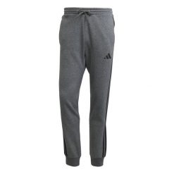 Spodnie do biegania adidas Essentials 3-Stripes Fleece. Szare buty sportowe męskie Adidas, bez zapięcia, do biegania. Za 308.00 zł.