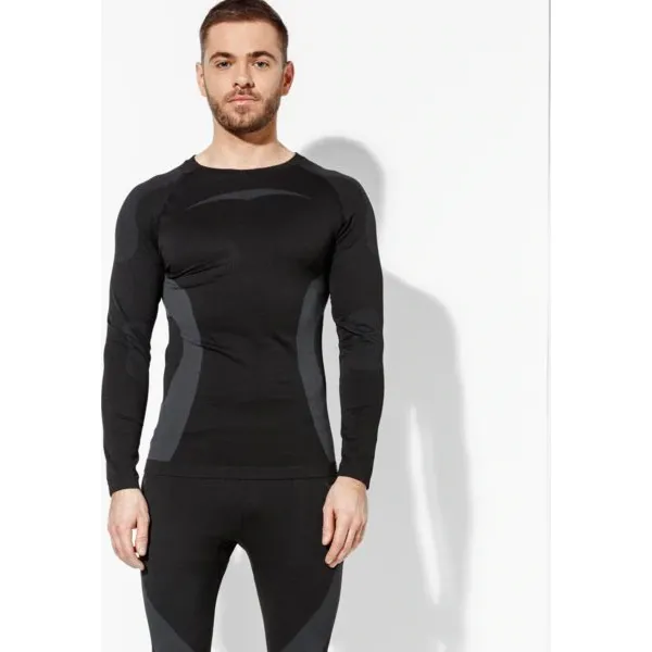Feewear Koszulka Ls Arctic , czarny, rozmiar XL/XXL. Czarne bluzki z długim rękawem męskie Feewear, xl, bez wzorów, z elastanu, bez kołnierzyka. W wyprzedaży za 79.99 zł.