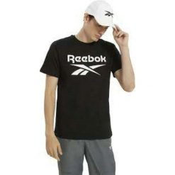 Koszulka z krótkim rękawem Męska Reebok 100070405 XL. Czarne koszulki sportowe męskie Reebok, m, bez wzorów, bez kołnierzyka, bez ramiączek, do biegania. Za 89.99 zł.