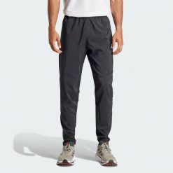 Spodnie Own The Run. Czarne buty sportowe męskie Adidas, z materiału, bez zapięcia, do biegania. Za 259.00 zł.