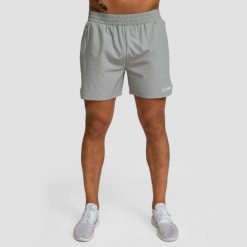 Szorty męskie functional training regular fit z kieszeniami szare TRN. Szare krótkie spodenki sportowe męskie GYMBEAM, m, bez wzorów, z elastanu, do biegania. Za 83.90 zł.