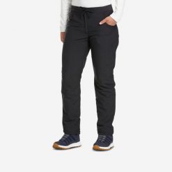 Spodnie turystyczne damskie Quechua NH100 Warm. Czarne spodnie sportowe damskie QUECHUA, l, bez wzorów, z materiału, trekkingowe. Za 129.99 zł.