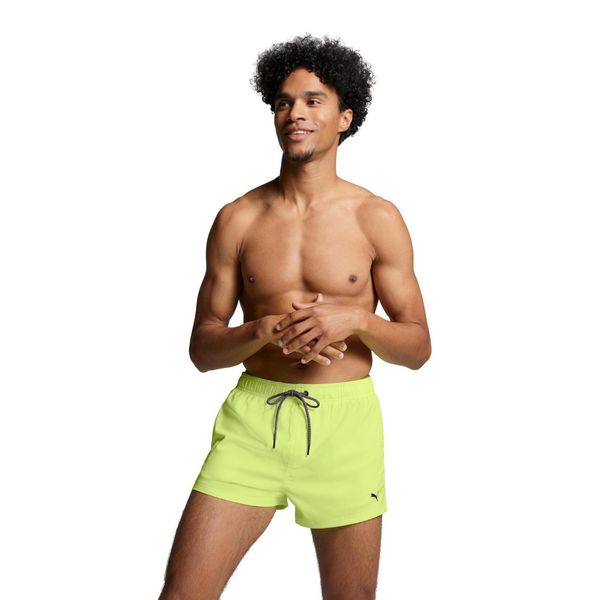 Męskie kąpielówki Puma, krótkie, Fast Yellow. Żółte kąpielówki męskie Puma, m, bez wzorów, krótkie, na fitness i siłownię. Za 173.99 zł.