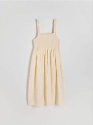 Muślinowa sukienka mini na ramiączkach - kremowy. Białe sukienki damskie Reserved, l, bez wzorów, z bawełny, bez kołnierzyka, bez ramiączek, mini, rozkloszowane. W wyprzedaży za 79.99 zł.