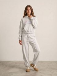 Spodnie dresowe jogger z dzianiny terry z przeszyciami i haftem - szary. Szare spodnie dresowe damskie Sinsay, l, bez wzorów, z dresówki. Za 39.99 zł.
