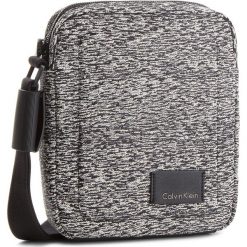 Saszetka CALVIN KLEIN - Ilay Jacquard Report K50K502887 907. Szare saszetki męskie marki Calvin Klein, z materiału, młodzieżowe. W wyprzedaży za 249.00 zł.