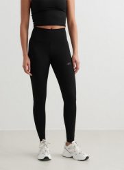 Damskie legginsy z wysokim stanem, odprowadzające pot Sculpting czarne. Czarne legginsy damskie Aim'n, s, bez wzorów, z lycry, z podwyższonym stanem, do biegania. Za 203.40 zł.