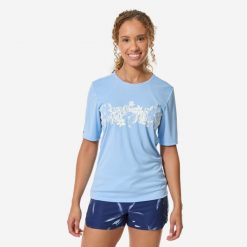 Top UV surfingowy damski Decathlon Malou Aloha krótki rękaw. Niebieskie koszulki sportowe damskie Decathlon, l, bez wzorów, z dzianiny, bez kołnierzyka, bez ramiączek. Za 49.99 zł.