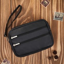 Saszetka męska skórzana do ręki kompaktowa klasyczna czarna Abruzzo ABR-40. Czarne saszetki męskie ze skóry, klasyczne. Za 99.00 zł.