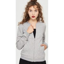 Bluza bomberka - Jasny szar. Bluzy damskie marki KALENJI. W wyprzedaży za 29.99 zł.