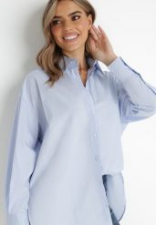 Jasnoniebieska Koszula Doriemara. Niebieskie bluzki damskie Born2be, l, bez wzorów, bez kołnierzyka, bez ramiączek. Za 84.99 zł.