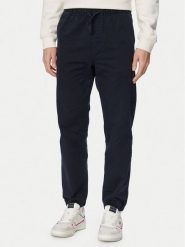 Tommy Jeans Joggery Sonny DM0DM22819 Granatowy Tapered Fit. Niebieskie spodnie materiałowe męskie Tommy Jeans, l, bez wzorów, z bawełny. Za 409.99 zł.