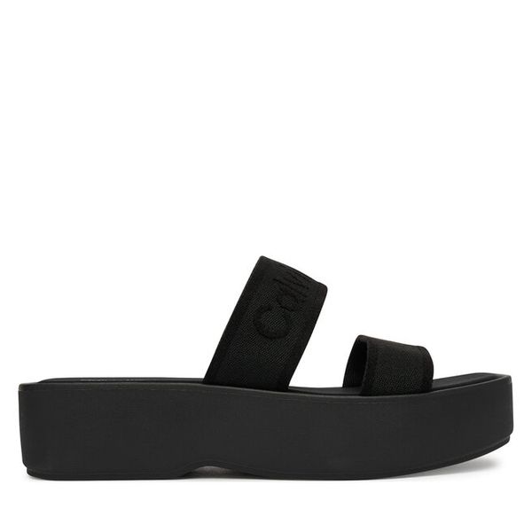 Klapki Calvin Klein. Czarne klapki damskie Calvin Klein, bez wzorów, bez obcasa. Za 179.99 zł.