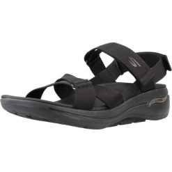 Sandały SKECHERS GO WALK ARCH FIT SANDAL Czarny. Czarne sandały damskie Skechers, bez wzorów, z materiału, bez obcasa, bez zapięcia. Za 344.40 zł.