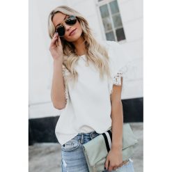 Damska bluzka BESINDA WHITE. Białe bluzki damskie Damska bluzka BESINDA WHITE, l, bez wzorów, bez kołnierzyka. W wyprzedaży za 49.00 zł.