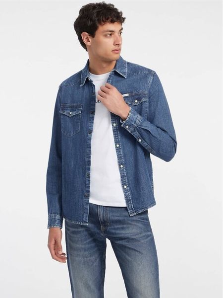 Guess Jeans Koszula jeansowa M4YH55 D5EI1 Granatowy Slim Fit. Niebieskie koszule męskie Guess Jeans, m, z aplikacjami, z bawełny, bez kołnierzyka, bez ramiączek. Za 314.99 zł.