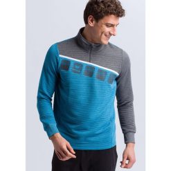 Bluza treningowa Erima 5-C. Niebieskie bluzy sportowe damskie Erima, na zimę, bez wzorów, bez kołnierzyka, bez ramiączek, bez kaptura. Za 312.99 zł.