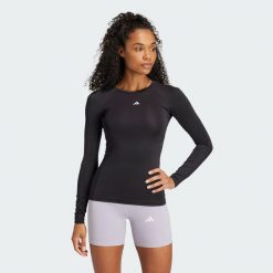 Koszulka TECHFIT Long Sleeve Training. Czarne koszulki sportowe damskie Adidas, xl, bez wzorów, z materiału, sportowe, bez kołnierzyka. Za 199.00 zł.