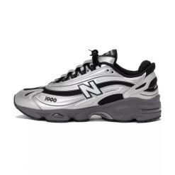 Buty biegowe New Balance M1000. Czarne obuwie sportowe damskie New Balance, bez wzorów, z materiału, trekkingowe. Za 479.00 zł.