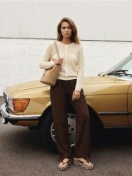 Bawełniany ażurowy kardigan - kremowy. Białe kardigany damskie Sinsay, l, w ażurowe wzory, z bawełny. Za 49.99 zł.