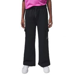 Spodnie dziewczęce Nike Sportswear czarny. Czarne spodnie materiałowe dla dziewczynek Jordan, bez wzorów, z materiału. Za 249.99 zł.