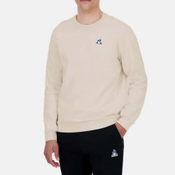 Bluza polarowa LE COQ SPORTIF ESS CREW SWEAT N1 Beżowy. Białe bluzy męskie le coq sportif, m, bez wzorów, z polaru, bez kaptura. Za 298.20 zł.