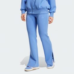 Spodnie Soft Lux Flared. Niebieskie obuwie sportowe damskie Adidas, bez wzorów, na fitness i siłownię. Za 299.00 zł.