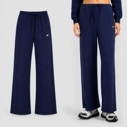 SPODNIE DRESOWE DAMSKIE 4F Z SZEROKĄ NOGAWKĄ SPORTOWE NIEBIESKIE. Niebieskie spodnie sportowe damskie 4f, xl, bez wzorów, z bawełny, na fitness i siłownię. Za 159.99 zł.