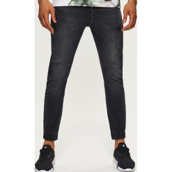 Jeansy SLIM JOGGER - Szary. Jeansy męskie marki Cropp. Za 129.99 zł.