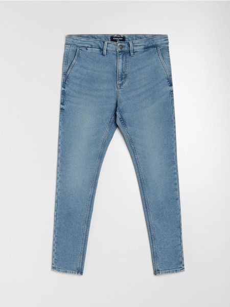 Jeansy chino slim fit - niebieski. Niebieskie jeansy męskie Sinsay. Za 99.99 zł.