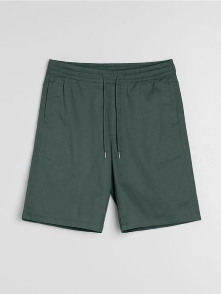 Bawełniane szorty jogger - zielony. Zielone szorty męskie Sinsay, m, bez wzorów, z bawełny. Za 35.99 zł.
