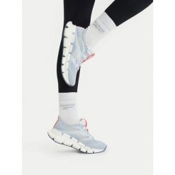 Buty do biegania Reebok. Niebieskie obuwie sportowe damskie Reebok, bez wzorów, do biegania. Za 489.99 zł.