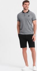 Ombre Szorty męskie SLIM FIT ze strukturalnej dzianiny - czarne V2 OM-SRCS-0126 XXL. Czarne krótkie spodenki sportowe męskie Ombre, m, bez wzorów, z dzianiny. Za 69.99 zł.