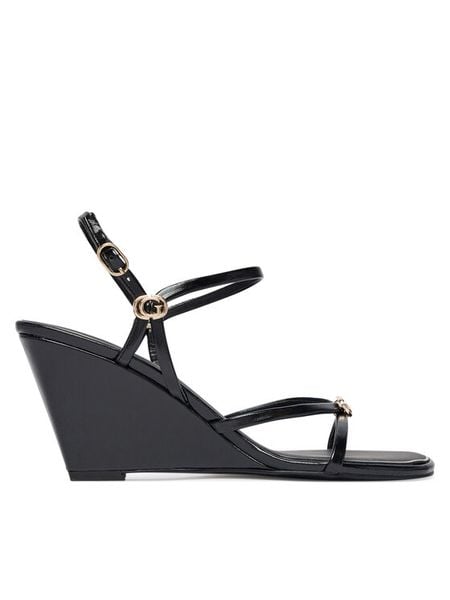 Guess Sandały FLTDVV PAF04 Czarny. Czarne sandały damskie Guess, z aplikacjami, bez obcasa, na koturnie, bez zapięcia. Za 494.99 zł.