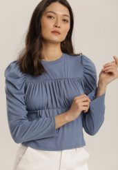 Niebieska Bluzka Daeicea. Niebieskie bluzki damskie Renee, bez wzorów, z bawełny, bez kołnierzyka, bez ramiączek. Za 49.99 zł.